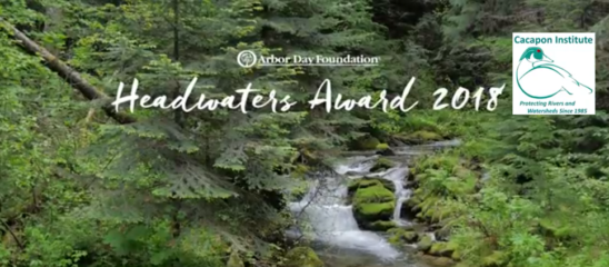 Forested mountain stream with words Arbor Day Foundation Headwaters Award 2018 and Cacapon Institute logo.